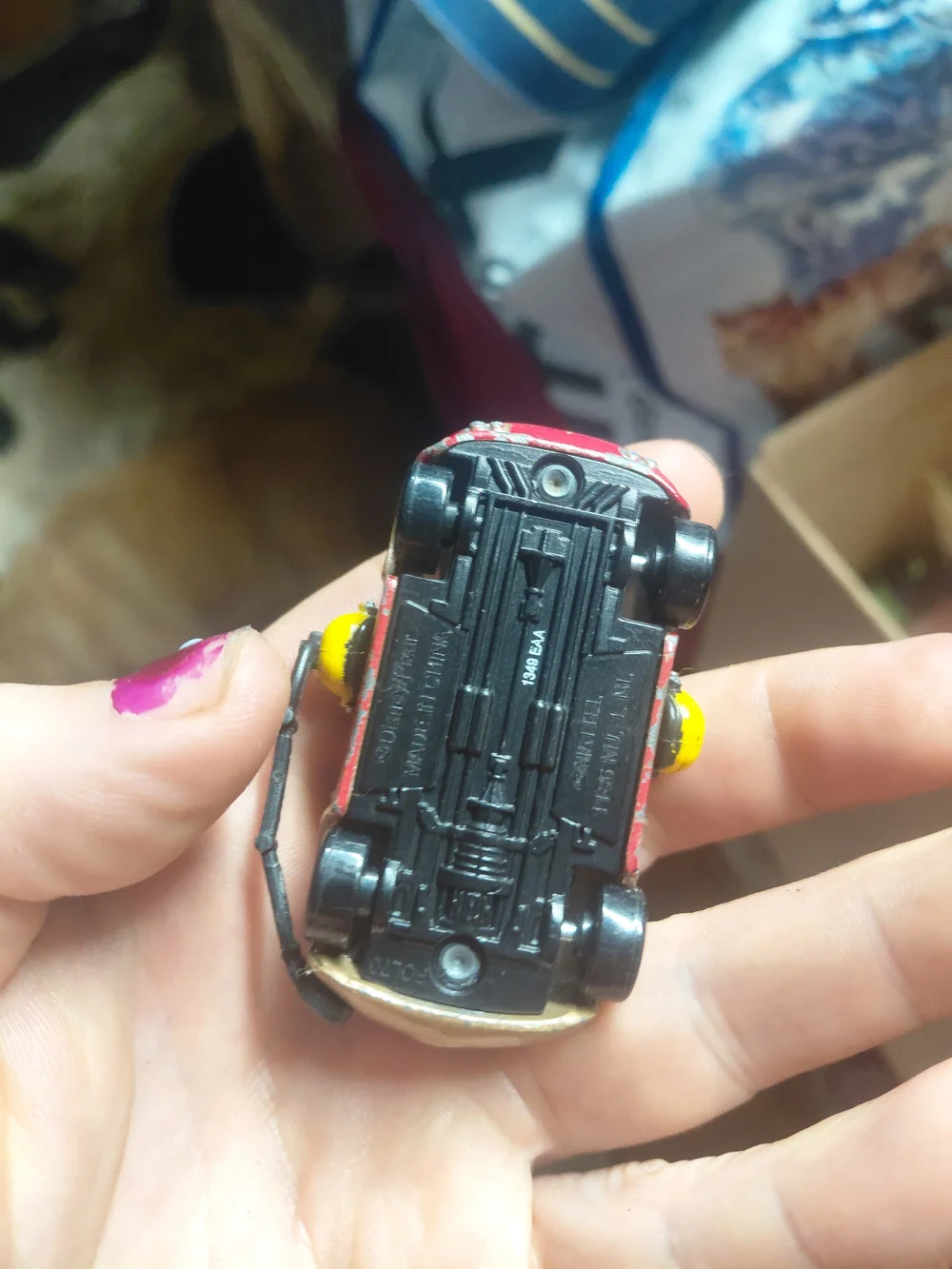 diecast toy is a 1:55 scale Mattel Disney Pixar Cars character named Shannon Spo
